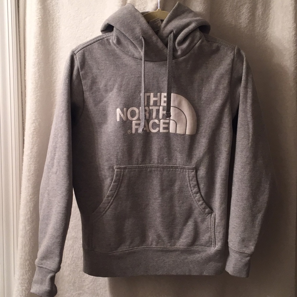 Gray North Face hoodie.